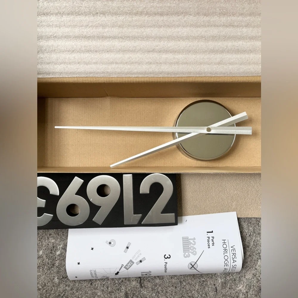 Torre & Tagus Versa DIY Adhesive large silver tone black Wall Clock